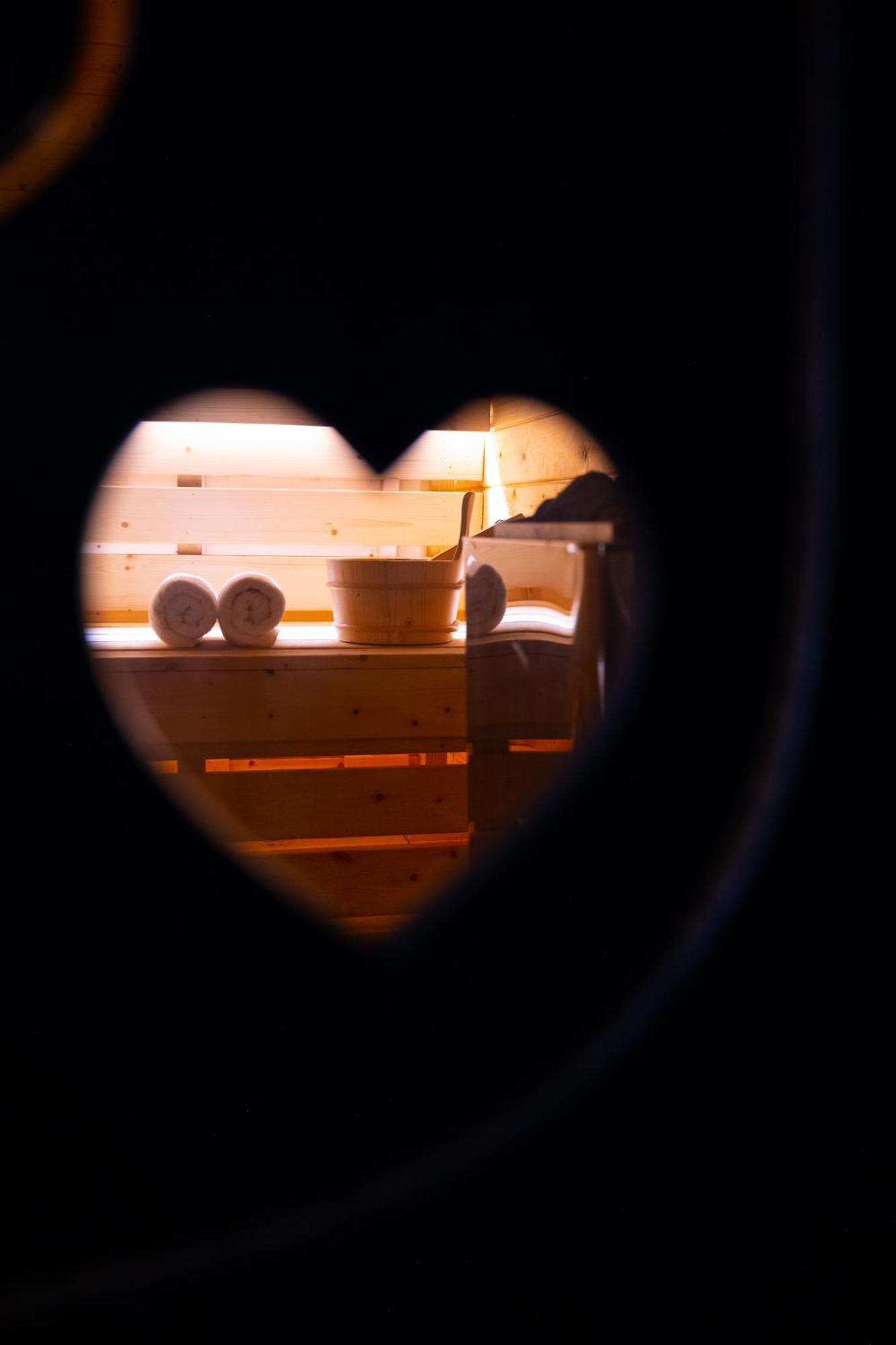 Arka Art Hotel Tirana Exteriör bild A heart-shaped hole in a sauna door