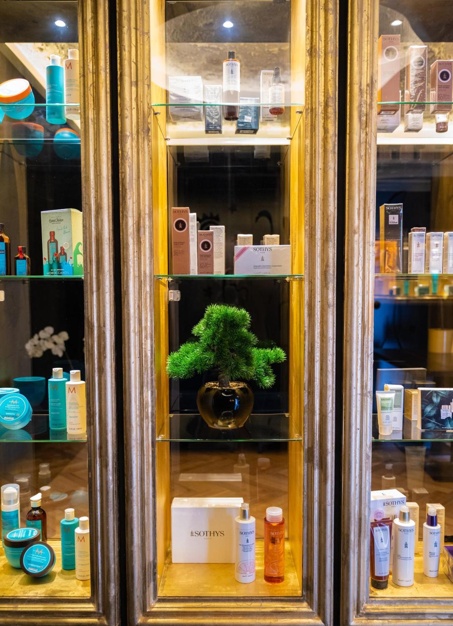 Arka Art Hotel Tirana Exteriör bild A display of various skincare products